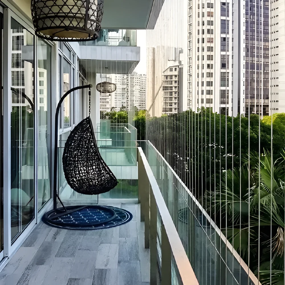 Stainless steel invisible grills securely installed on modern balconies for maximum safety